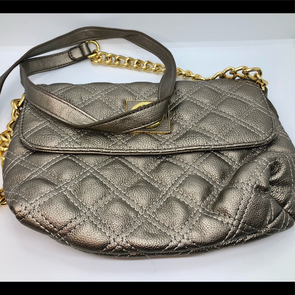 Woman’s small handbag silver gold tone